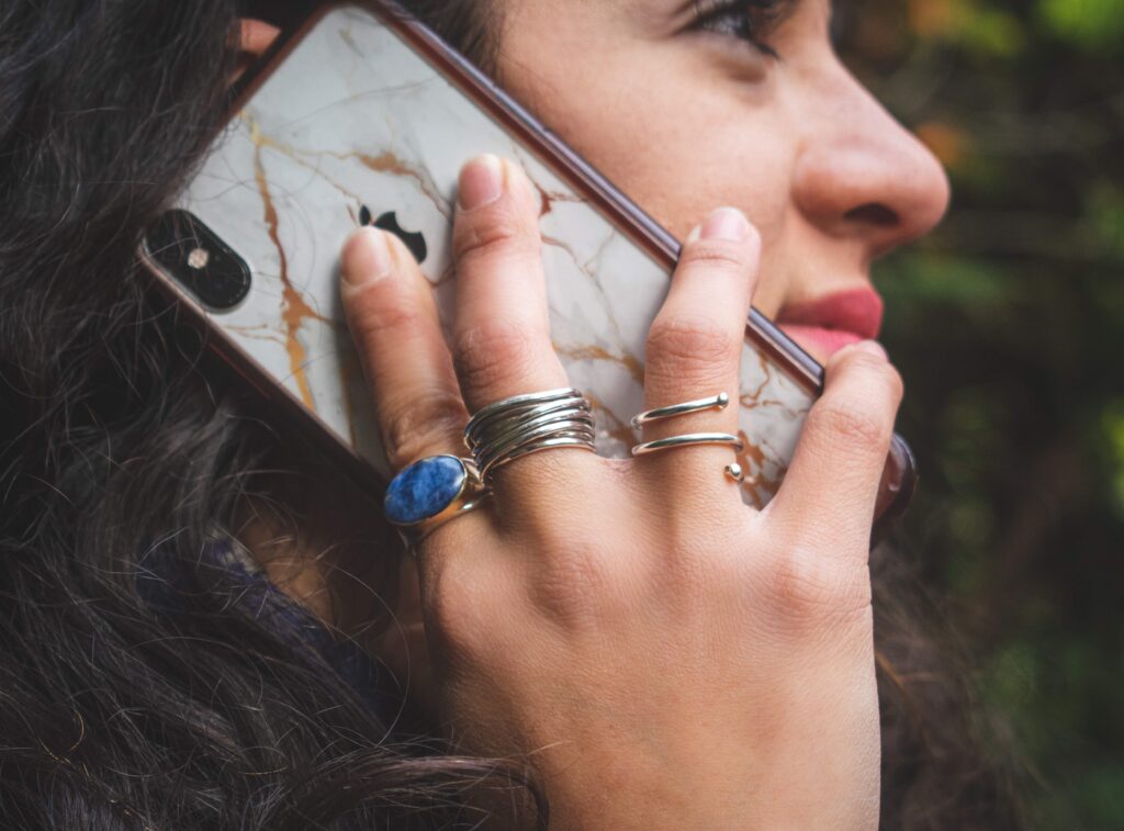 woman talking on the phone for connection during winter