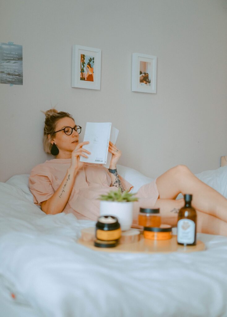 woman reading for self-care