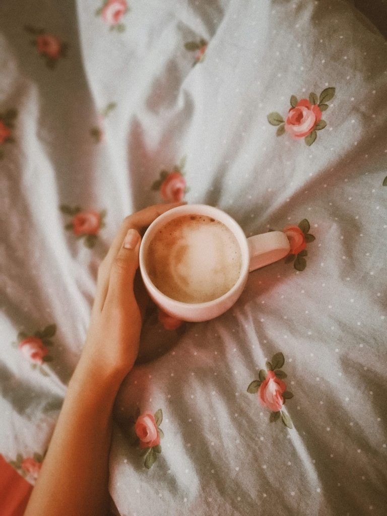 cozy self-care moment with tea and blanket for relaxation and stress relief
