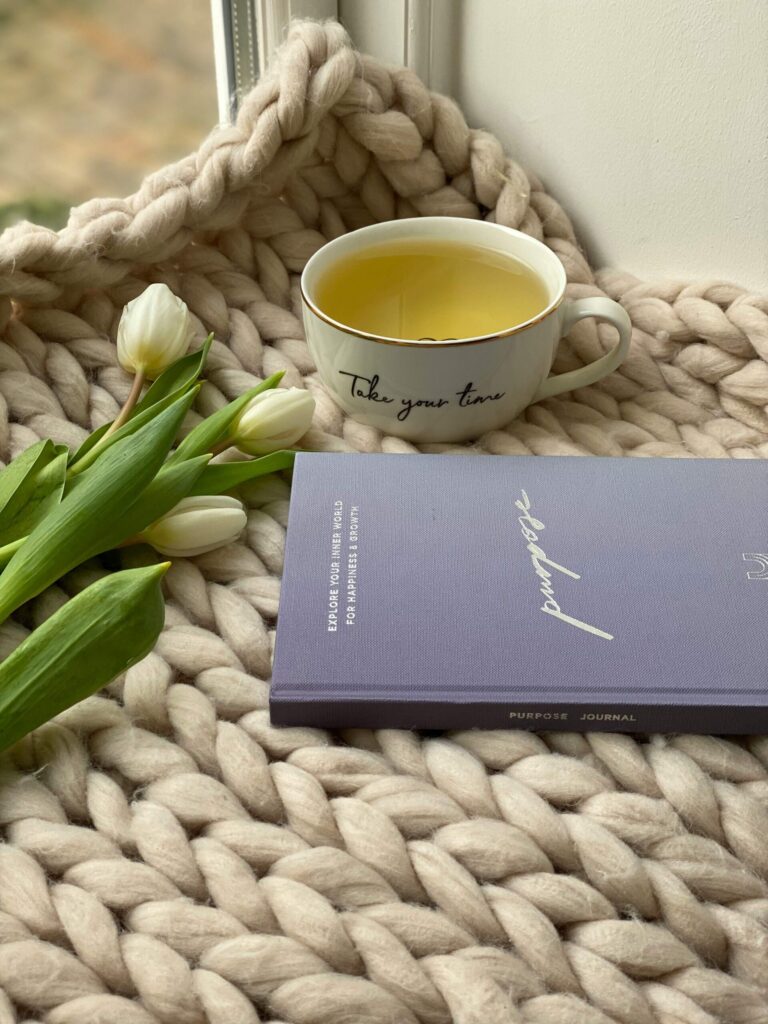 Spring journaling activity for midlife women with flowers and tea