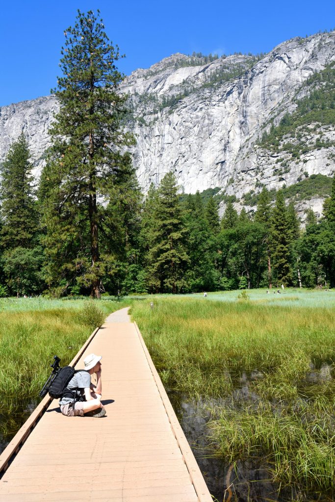 woman hiking outdoors reflecting on life changes and personal growth goals