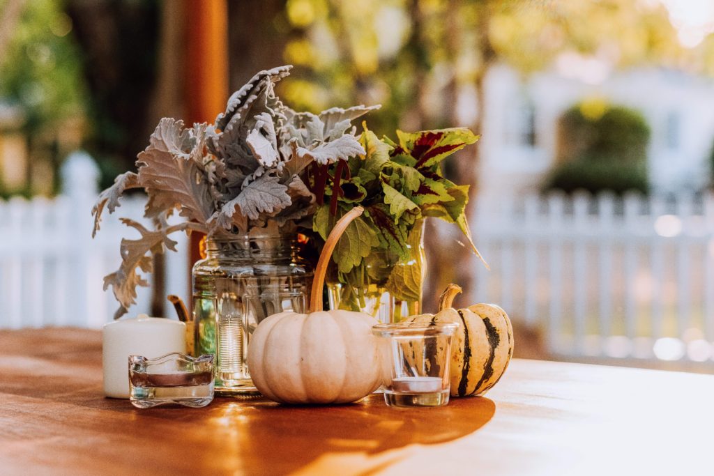 Use nature inspired items like pumpkins and leaves when decorating on a budget