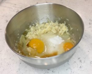 eggs, sugar, bananas and vanilla in mixing bowl