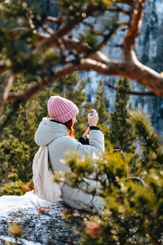 woman sitting peacefully outdoors representing healing and hope for anxiety and depression in midlife women