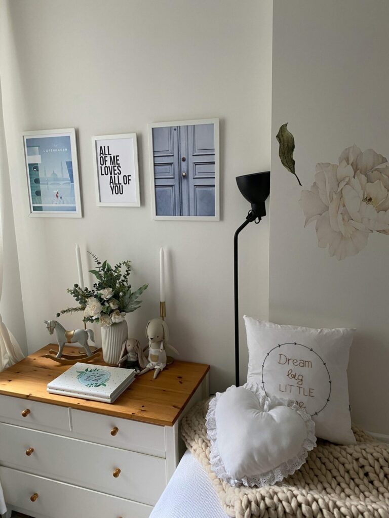 tidy bed and nightstand area perfect for self-care 
