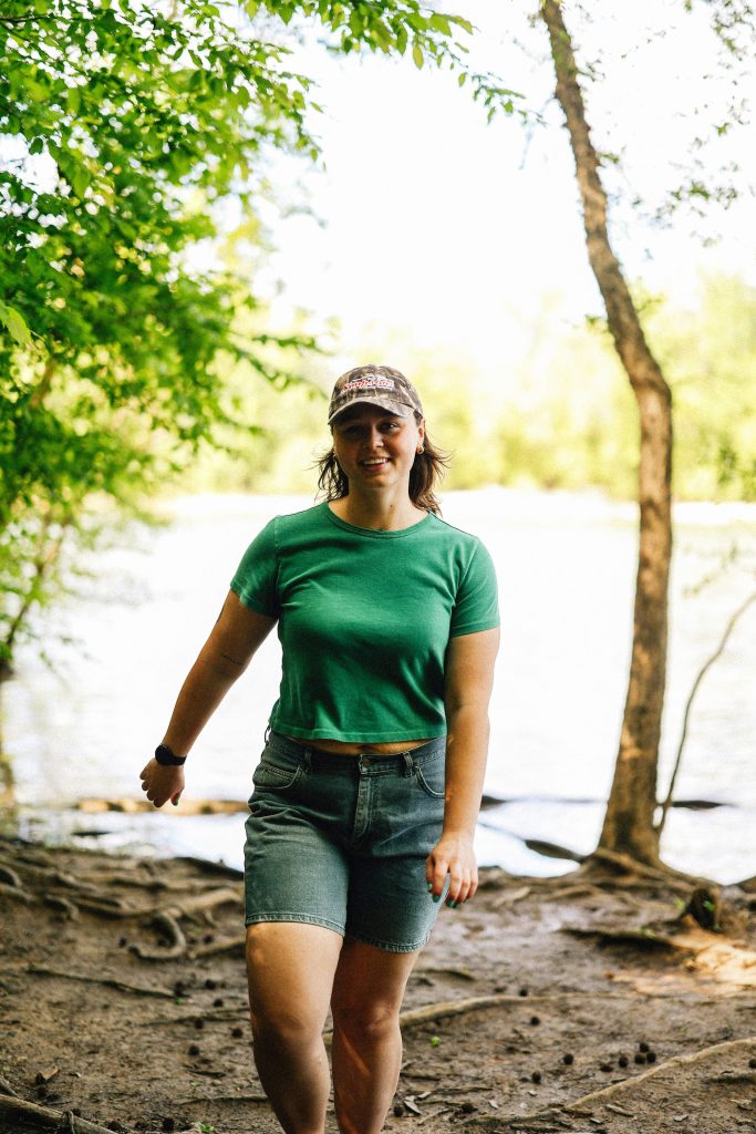 Midlife woman walking outdoors as part of a healthy wellness routine and balanced lifestyle.