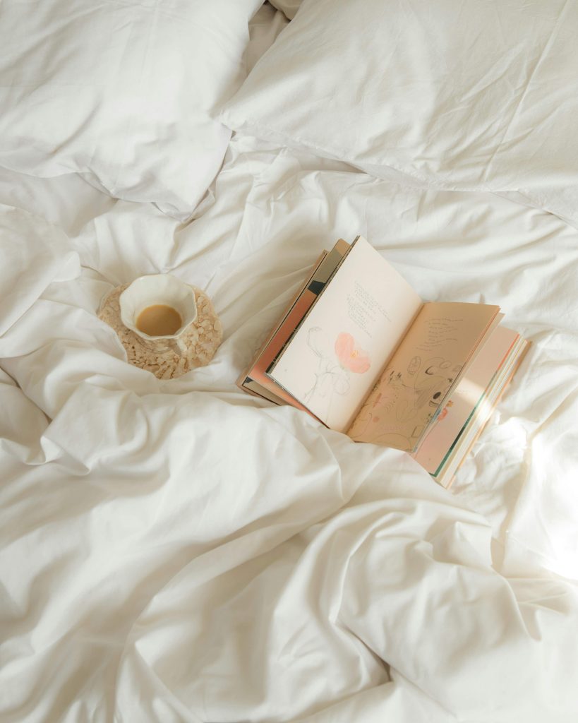 Cozy evening journaling setup with notebook, and tea for reflection and calm using easy journaling ideas before bed