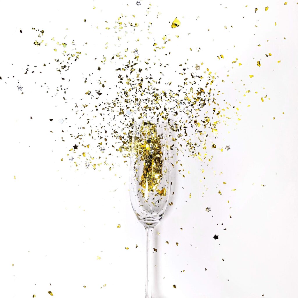 champagne glass with confetti