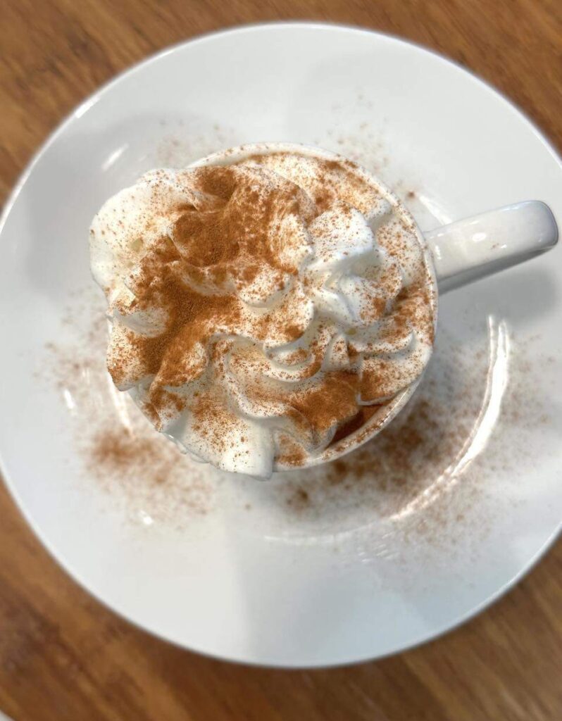 vanilla coffee recipe in a mug with whipped cream