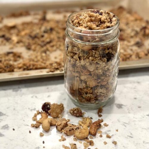 gluten-free granola on pan and in jar