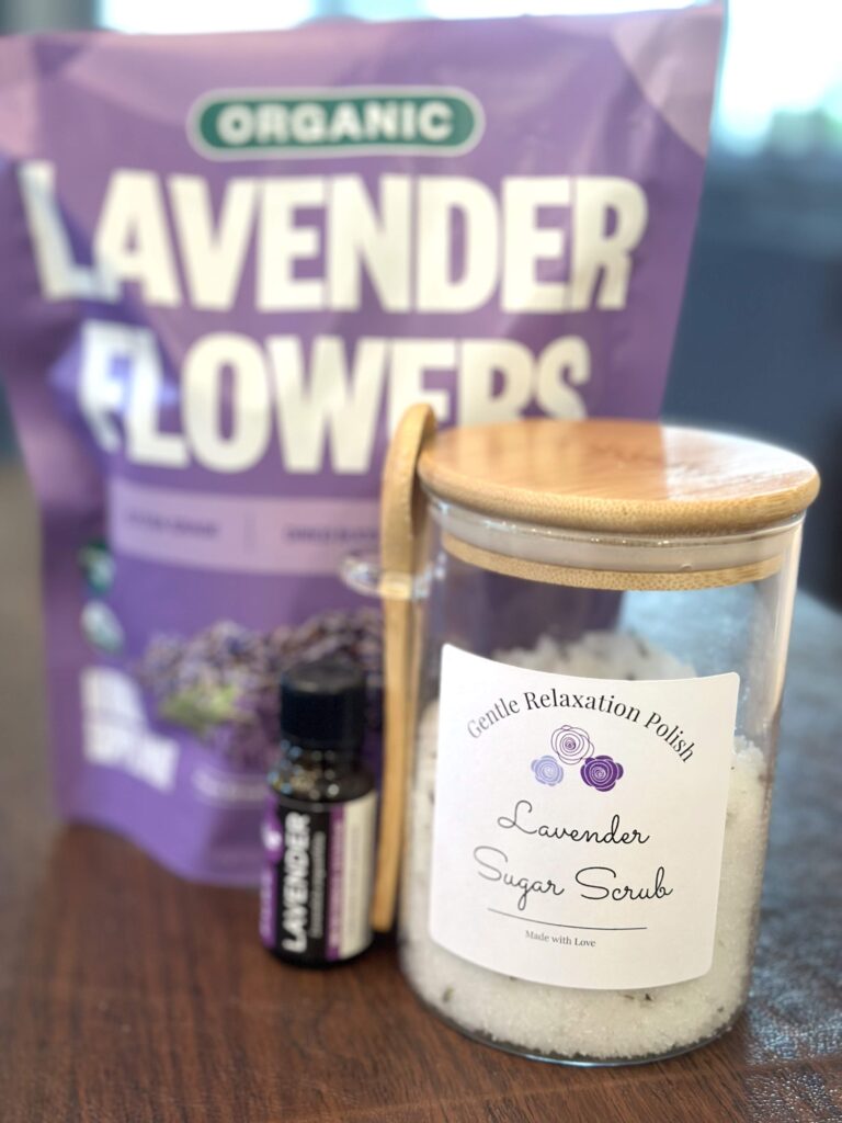 Lavender sugar scrub with essential oil and lavender flowers