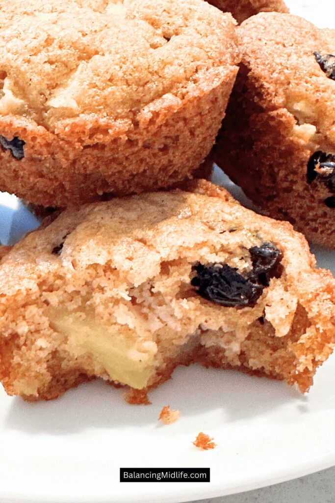 Moist apple cranberry muffins with dried cranberries and diced apples