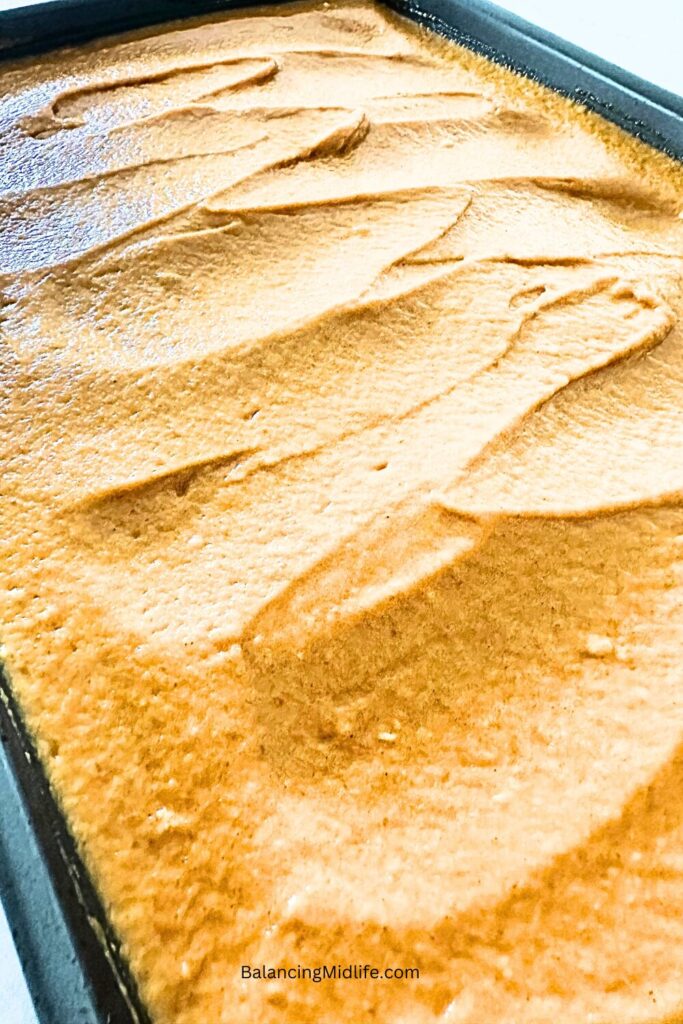 pumpkin bar batter in jelly roll pan