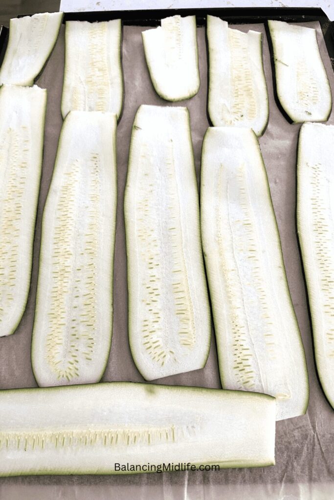 zucchini slices on a baking sheet