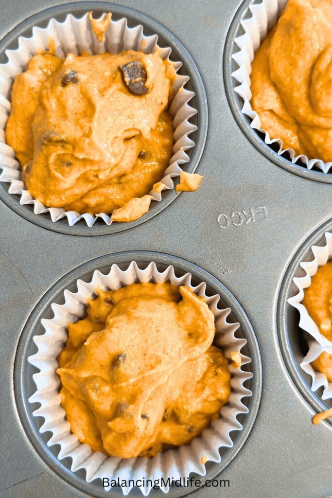 pumpkin chocolate chip muffin batter in baking pan