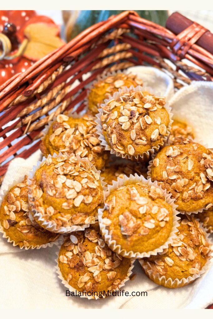 pumpkin chocolate chip muffins in a basket