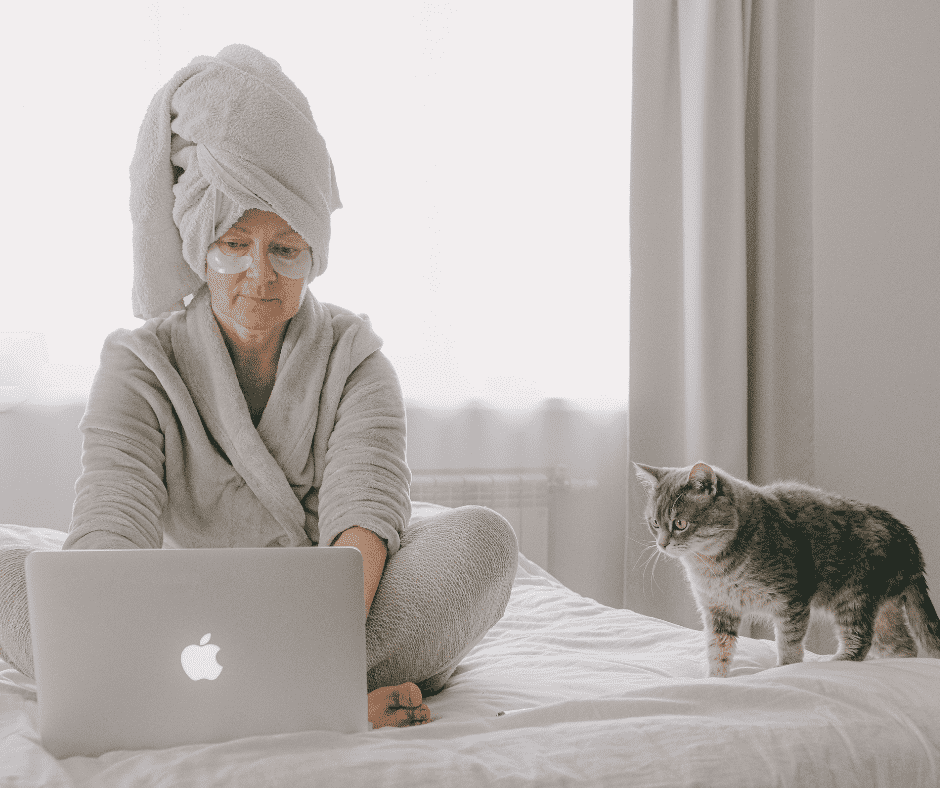 woman in a robe, winter self-care essentials