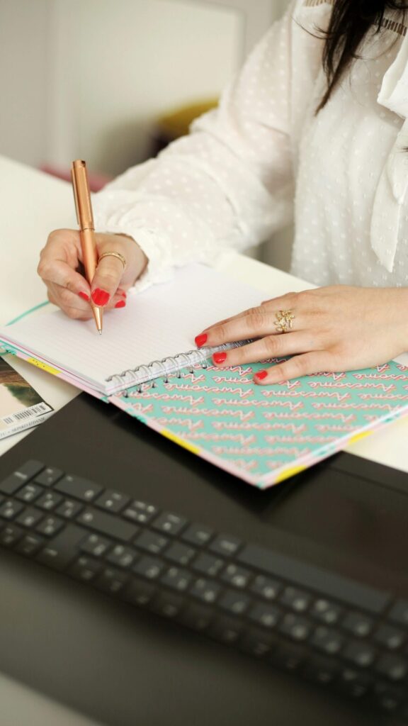 Filling in a time block planner to organize daily schedule