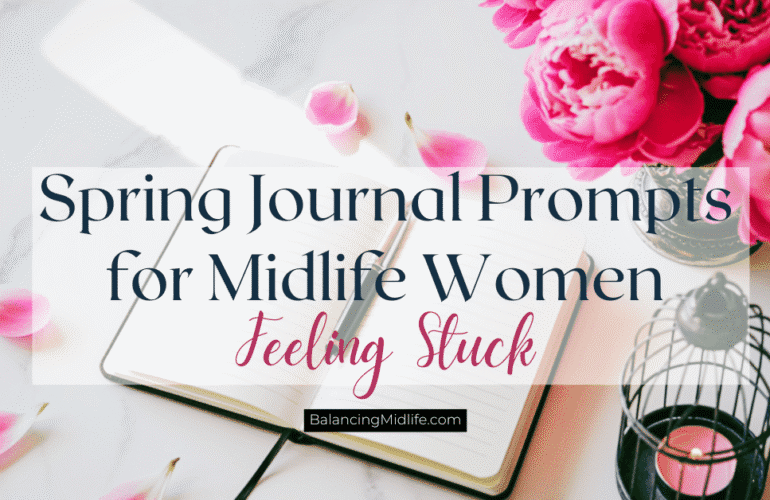 Spring journal prompts for midlife women with a journal, and blooming flowers on a table