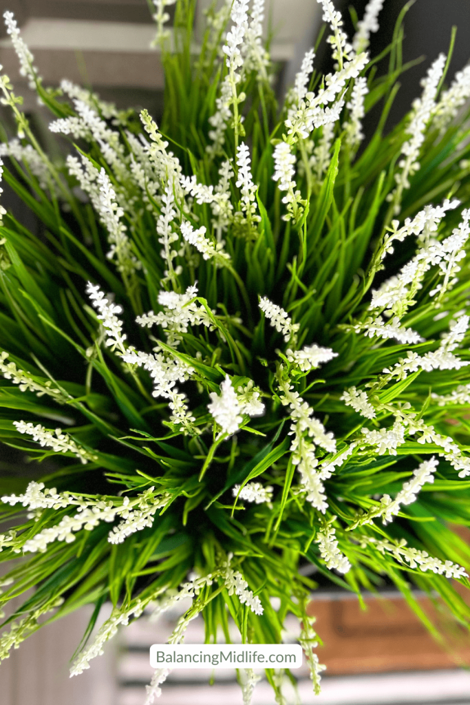 faux greenery is an easy summer front decor idea