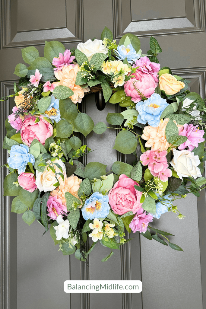 summer front door wreath on dark front door
