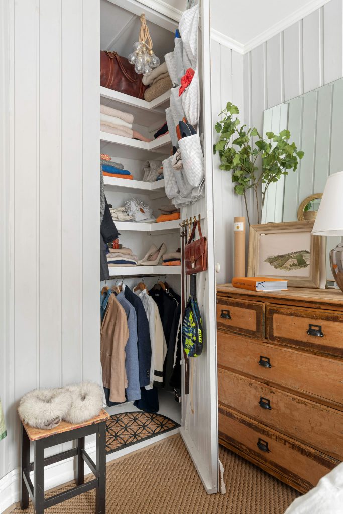 Organized fall wardrobe with sweaters, jackets, and slippers