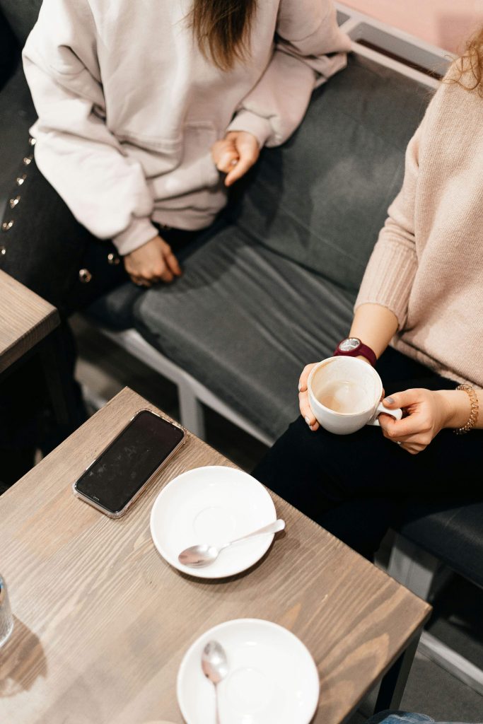 Two women enjoying time together while simplifying their commitments and making room for meaningful relationships.