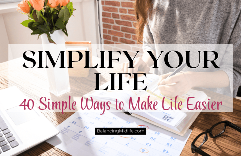 Woman sitting at a table in a comfortable home with a notebook and coffee, representing a simplify your life checklist with simple ways to make life easier.
